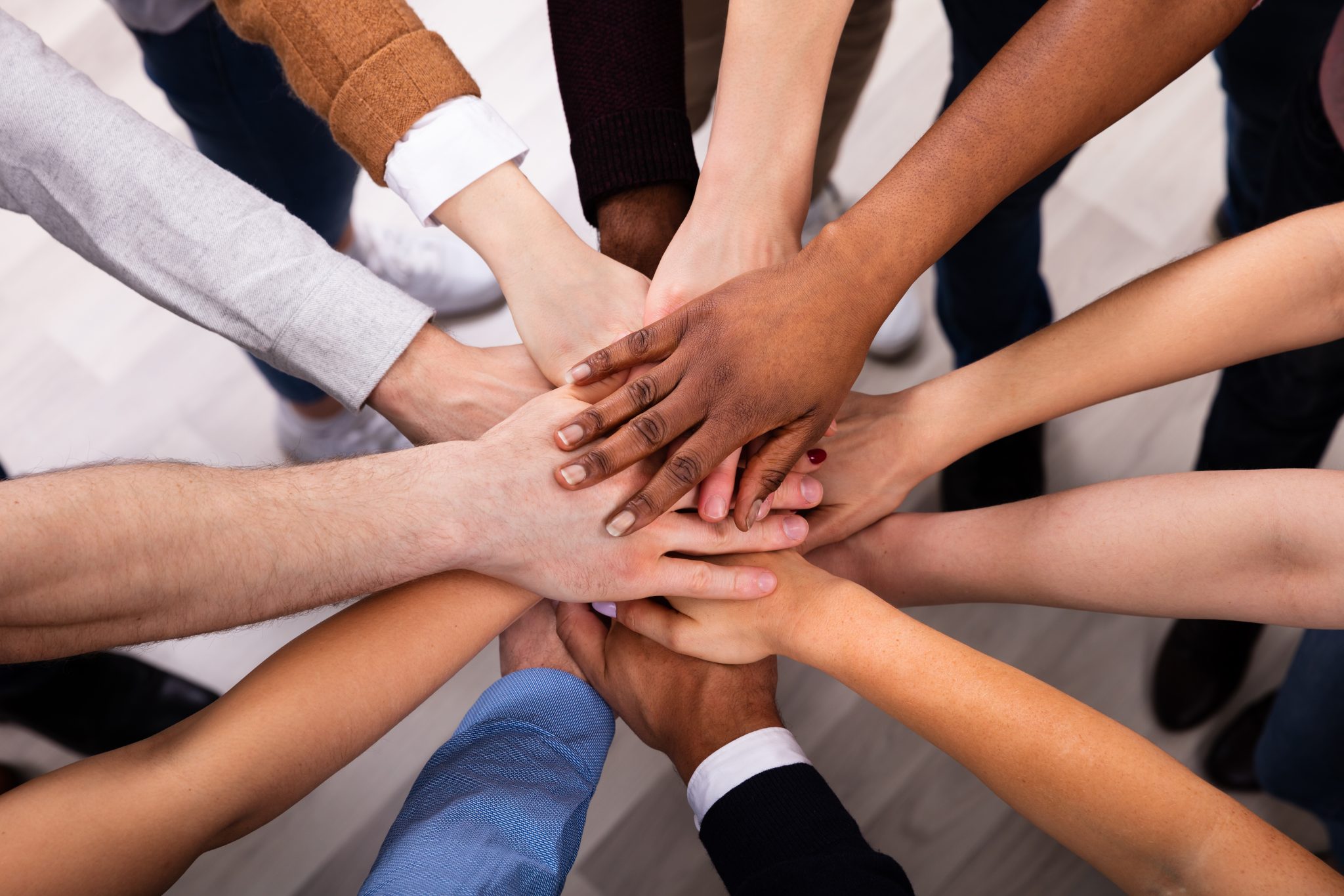 Diverse-People-Stacking-Hand-Together